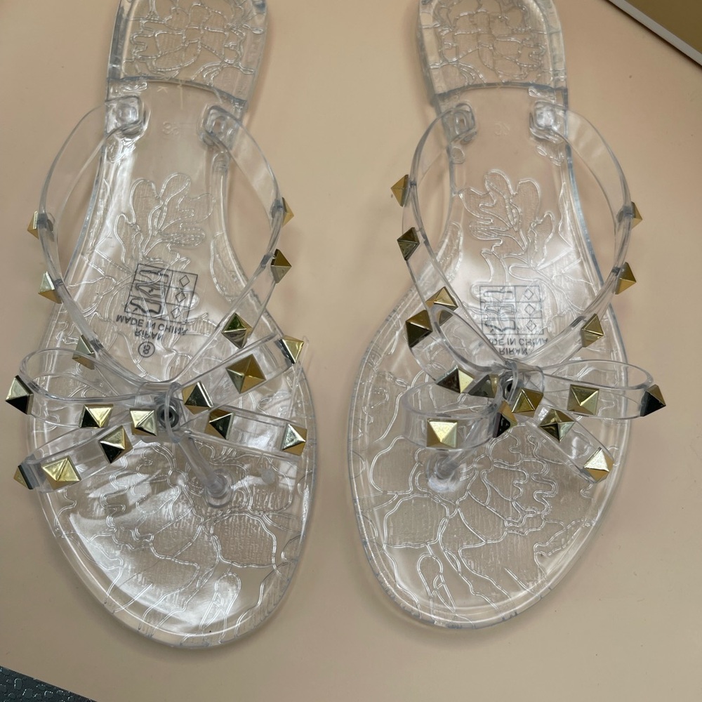 Stylish Clear Sandals with Gold Accents